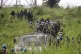 United Nations peacekeepers remove bodies from an area near 
