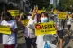 Anti-coup protesters flash the three-finger sign of defiance