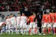 In this April 1, 2009, file photo, North Korean players, wea