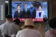 A TV shows a file image of North Korean leader Kim Jong Un, 