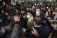 Iranian President Ebrahim Raisi talks with patients and thei