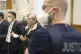 Anwar Raslan (centre) stands in the courtroom before the pro