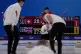 Britain's Bruce Mouat, leads his teammates, during the men's