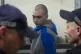 Russian army Sergeant Vadim Shishimarin, 21, is seen behind 