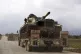 Turkish military convoy drives through the village of Binnis
