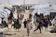 Children gather outside their tents, at al-Hol camp, which h
