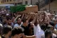 Mourners carry the coffin of Palestinian Abdul-Al Omar Abdul