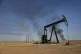 A smoke rises from an oil depot struck by Turkish air force 