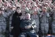 North Korean leader Kim Jong Un and his daughter pose with s