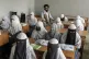 Afghan girls attend a religious school, which remained open 