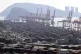 Stacked containers fill a port in Busan, South Korea, Thursd