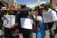 Residents hold a funeral procession for protesters killed du