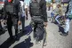 Armed police officers stands with his weapons drawn during a