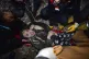 Rescue workers and medics carry a woman out of the debris of