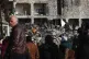 Rescue teams search through the wreckage of collapsed buildi