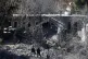 Journalists report from the damage of a medieval citadel aft