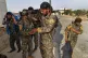 In this June 22, 2017 photo, US-backed Syrian Democratic For