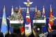 Col. Isaac Taylor, left, of the United Nations Command (UNC)