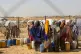 Pastoralist women and children displaced by drought collect 