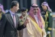 Syrian President Bashar Assad, is accompanied by Prince Badr