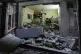 Palestinians inspect a damaged building following an Israeli
