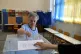 A woman casts her vote at a voting center during municipal e