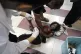An injured Palestinian girl receives treatment at the al-Shi