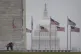 Visitors stand at the base of the Washington Monument as the
