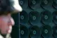 A South Korean army soldier stands near the loudspeakers nea