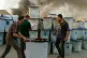 Iraqi electoral officials work to salvage ballot boxes as sm