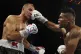 Eleider Alvarez (right), of Colombia, connects a punch to Se