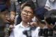 Reuters journalist Wa Lone (centre) talks to journalists dur