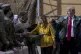 US President Donald Trump and Melania Trump greet members of