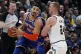 Enes Kanter (left) goes up against Denver Nuggets forward Ma