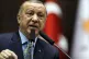 Turkey's President Recep Tayyip Erdogan talks to MPs of his 