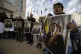 Palestinians hold photos of Venezuela's President Nicolas Ma