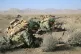 Iranian Army soldiers take position in an infantry drill in 