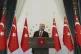 Turkey's President Recep Tayyip Erdogan speaks to a group of