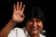 Bolivia's former President Evo Morales waves during a press 