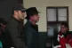 Former Mining Minister Cesar Navarro (centre) goes out of th