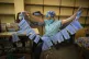 A worker at a state-owned Maternity Hospital manufactures fa