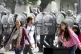 Police advance to disperse an anti-government protest agains