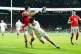Wales's Josh Adams is tackled by England's Tommy Freeman dur