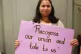 A UVW member hold a sign which reads: ‘Recognise our union