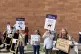 Protesters rally outside the Burrell Collection, one of Glas