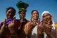 Mishing tribal women show the indelible ink marks on their i