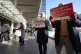 LGBTQ activists distribute chocolates to morning commuters a