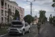 A Ukrainian soldier walks past at a city hall in Sudzha, Kur