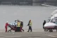 South Korean opposition leader Lee Jae-Myung, is transported