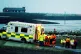 Rescue workers carry bodies into an ambulance at Morecambe l